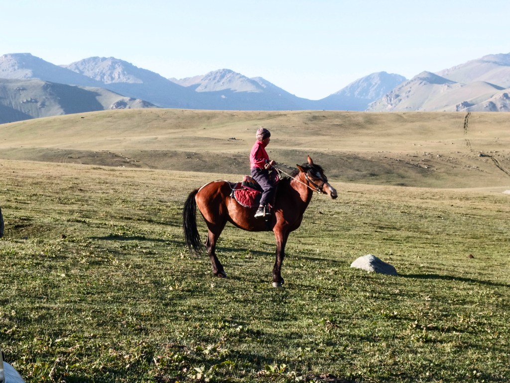 Photographie Kirghizistan paysage enfant a cheval